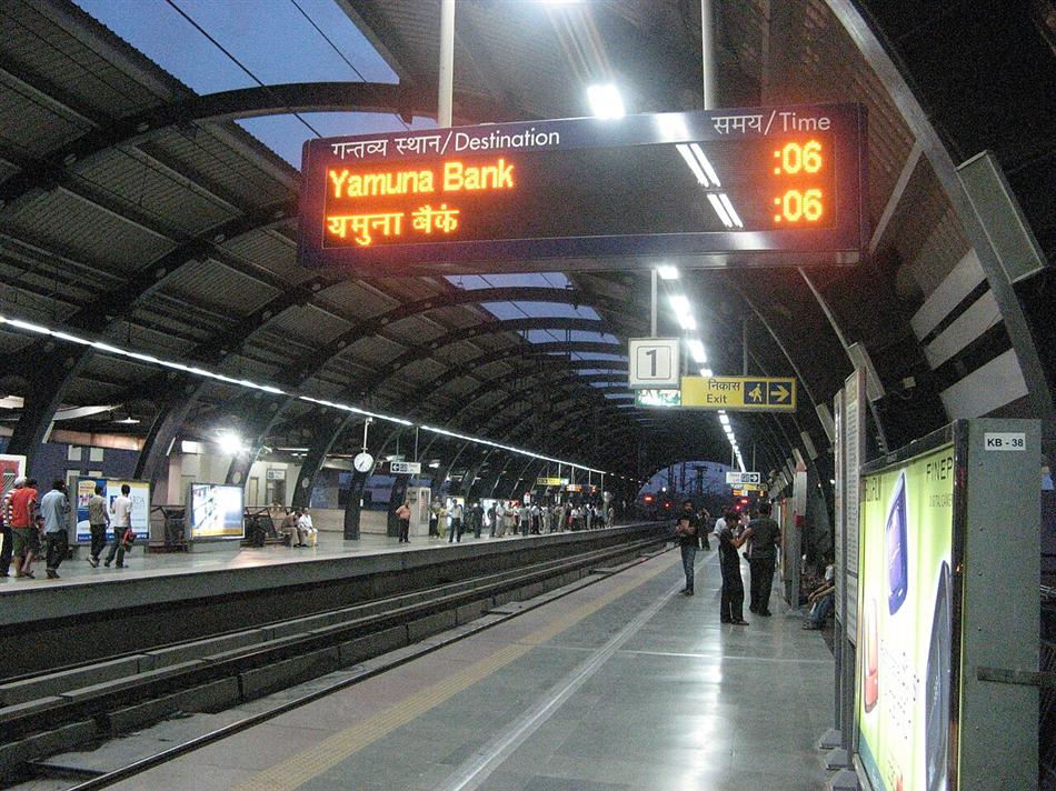 A Delhi Metro platform with the destination board lit